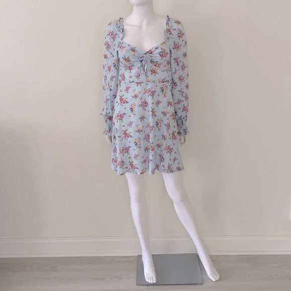knee length dresses for ladies Faithfull The Brand Women's Valrus Floral Print Flutter Sleeve Minidress - Blue main image 1